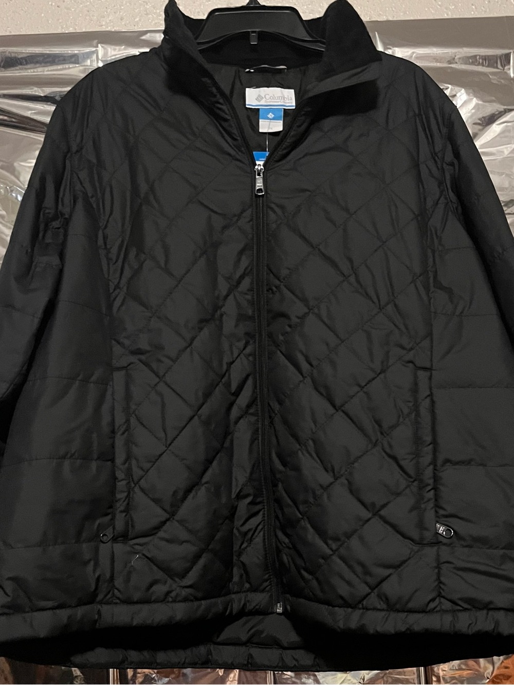 Columbia Black Quilted Jacket with Blue Logo Tag